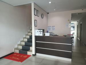 The lobby or reception area at AMBASSADOR LABUAN VIEW HOTEL