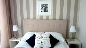 Posteľ alebo postele v izbe v ubytovaní Willa Długa No. 4 Bed & Breakfast