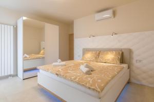 Apartments Abros 객실 침대 사진 99개 이상