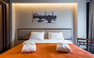 Letto o letti in una camera di Bridge Hotel