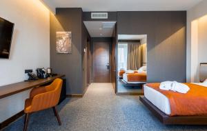 Letto o letti in una camera di Bridge Hotel