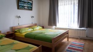 Apartment Kremžar Lokve客房内的一张或多张床位