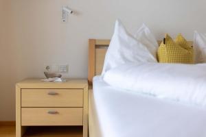 A bed or beds in a room at Ferienwohnung Flanuf
