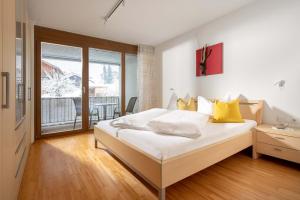 A bed or beds in a room at Ferienwohnung Flanuf