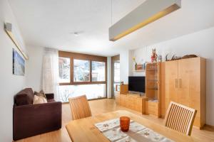 A television and/or entertainment centre at Ferienwohnung Flanuf