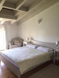 Postel nebo postele na pokoji v ubytování Casa del Monastero