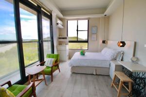 Cama o camas de una habitación en 嵵裡仙人掌海景民宿Ocean view room