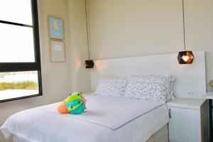 Cama o camas de una habitación en 嵵裡仙人掌海景民宿Ocean view room