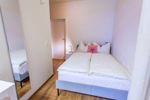 Posteľ alebo postele v izbe v ubytovaní Landhaus Tritscher