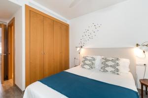 Posteľ alebo postele v izbe v ubytovaní Veoapartment Ponce León
