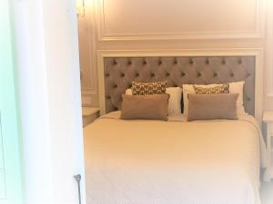 Un ou plusieurs lits dans un hébergement de l'établissement Hôtel restaurant Oasis