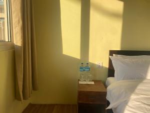 Letto o letti in una camera di Ocean Inn