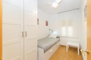 Ein Bett oder Betten in einem Zimmer der Unterkunft Cadillac lujo total sin pasar por un hotel