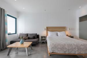 Postel nebo postele na pokoji v ubytování Afroessa Hotel by Pearl Hotel Collection + 37 fotografií