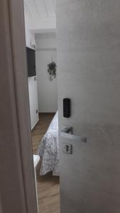 Postel nebo postele na pokoji v ubytování B&B Residenza Aragonese