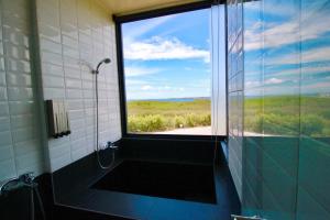 Imagen de la galería de 嵵裡仙人掌海景民宿Ocean view room, en Magong