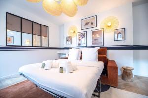 Кровать или кровати в номере MBM - Michelis