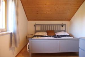 Postel nebo postele na pokoji v ubytování Haus Lina