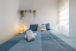 Posteľ alebo postele v izbe v ubytovaní PUERTA DEL MAR APARTMENT