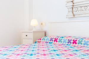 A bed or beds in a room at Tamarells 11