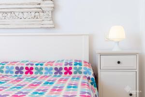 A bed or beds in a room at Tamarells 11