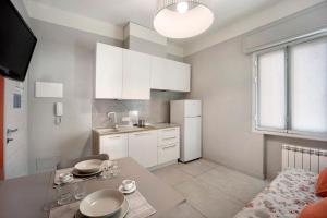 Køkken eller tekøkken på Victoria Apartments Mediterraneo