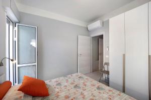 En eller flere senge i et værelse på Victoria Apartments Mediterraneo