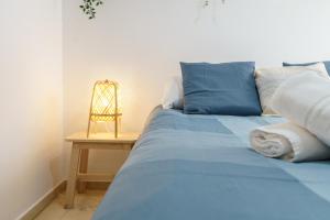 Posteľ alebo postele v izbe v ubytovaní PUERTA DEL MAR APARTMENT