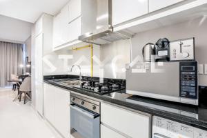Kuchyň nebo kuchyňský kout v ubytování Staycae Holiday Homes - Artesia