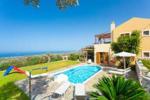 The swimming pool at or close to Villa Garifallia