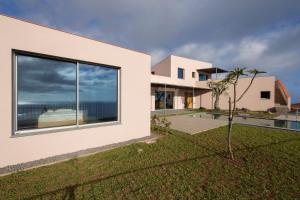a house with a view of the ocean at Casa Atlantico Suite in Ribeira Brava