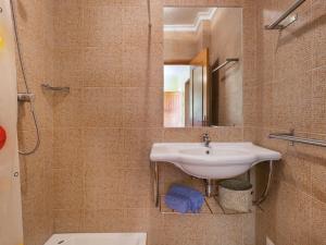 a bathroom with a sink and a toilet at Holiday Home Sunny Home by Interhome in Pêra