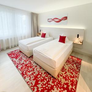 Letto o letti in una camera di Ramada by Wyndham Dresden