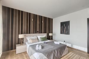 Postel nebo postele na pokoji v ubytování Villa Volimten