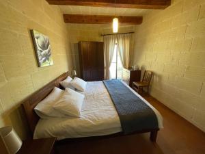 Postel nebo postele na pokoji v ubytování Gilju B&B + 35 fotografií