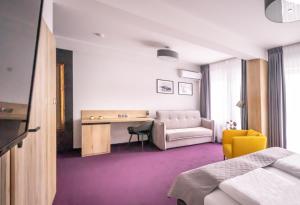Posteľ alebo postele v izbe v ubytovaní Apartamenty PORTO