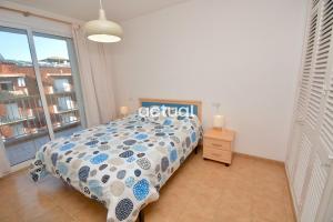 Postel nebo postele na pokoji v ubytování Catalunya C-3