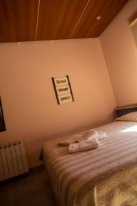 Cama ou camas em um quarto em Hotel El Libertador