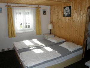 Postel nebo postele na pokoji v ubytování Vakantiehuis Cerny Dul 38