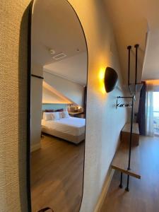 Postel nebo postele na pokoji v ubytování JovA Hotel Boutique