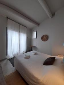 Katil atau katil-katil dalam bilik di Apparts Et Lofts Bistrot Des Alpilles