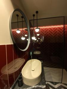 Koupelna v ubytování JovA Hotel Boutique