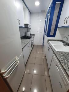 Una cocina o zona de cocina en Patacona Resort Apartments
