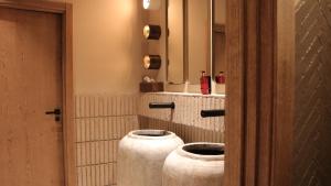 Koupelna v ubytování JovA Hotel Boutique