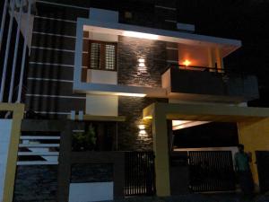 a model of a house at night at Sapthagiri Nest in Chikmagalūr