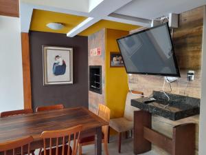 TV a/nebo společenská místnost v ubytování Casa 2 quartos