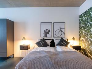 Säng eller sängar i ett rum på limehome Erfurt Maximilian Welsch Str
