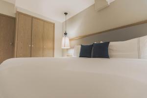 Postel nebo postele na pokoji v ubytování Hotel Santa Cecilia B&B