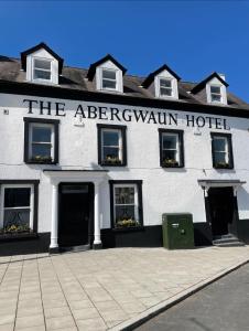 a white building with the entrance to a hotel at JT Abergwaun hotel in Fishguard