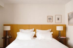 Postel nebo postele na pokoji v ubytování Le Val Thorens, a Beaumier hotel + 37 fotografií